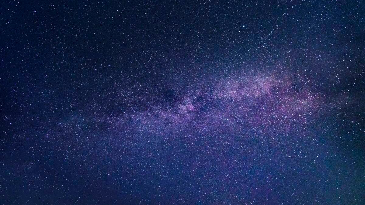 Milky way galaxy over the horizon