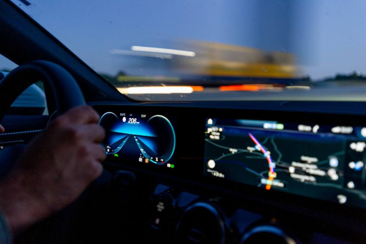 Person hand on steering wheel