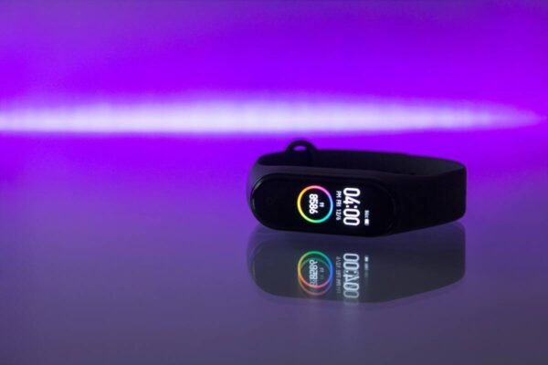 Black fitness tracker with a small display