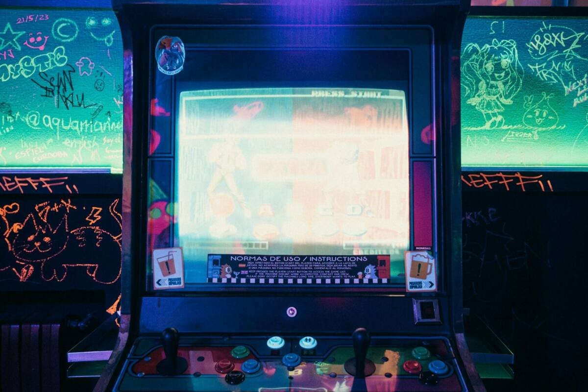 Vintage arcade machine glowing with neon lights