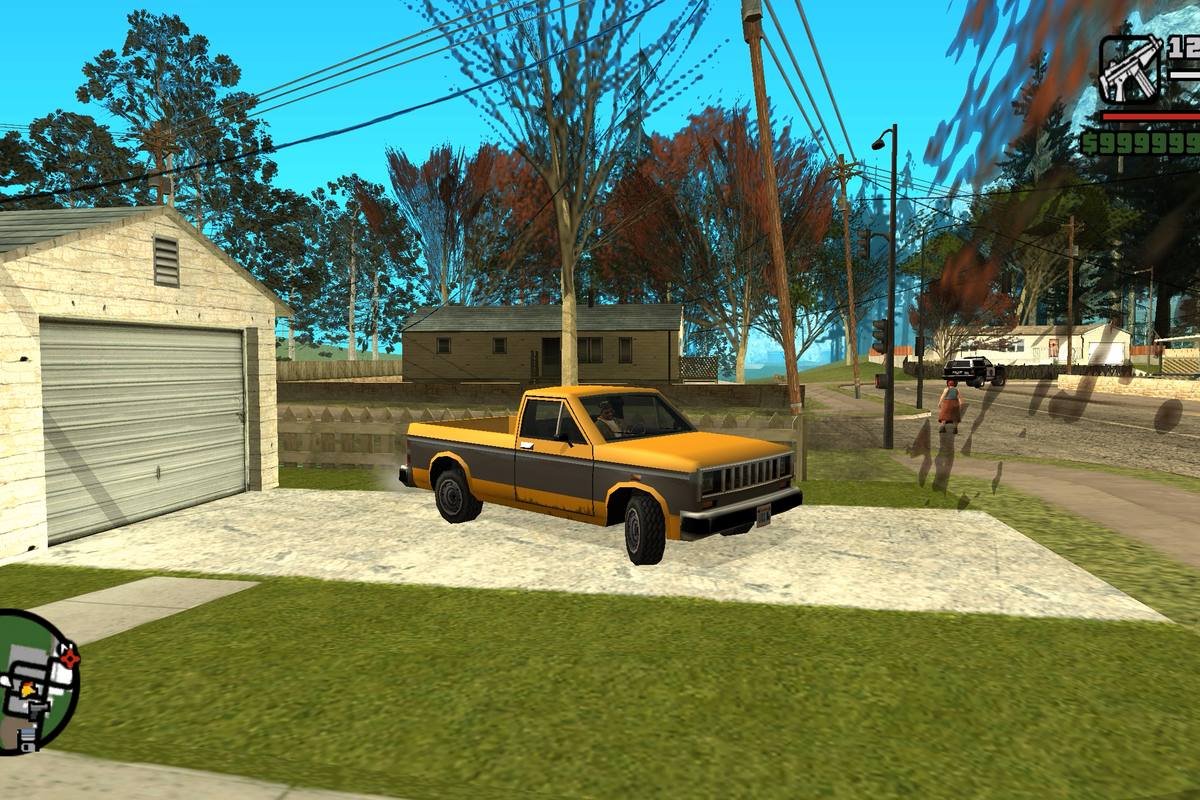 Orange and gray Bobcat pickup truck parked in a San Andreas driveway