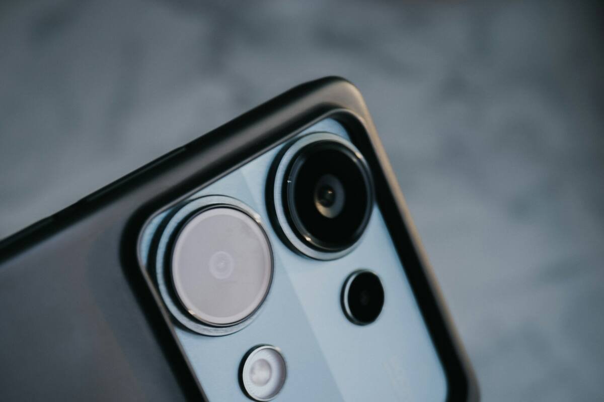 Close-up of a smartphone camera module with multiple lenses