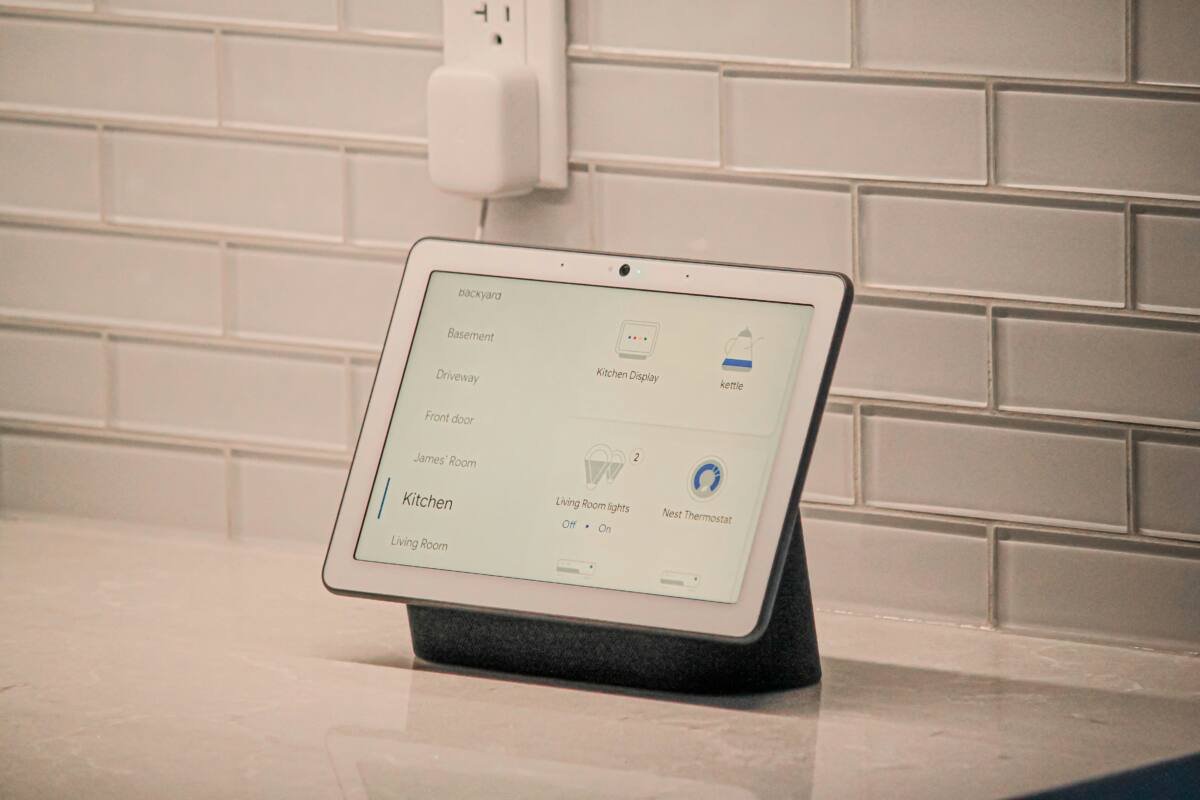 A smart display with a touchscreen sitting on a table